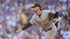 Pirates show late life but fall to Rockies on questionable call