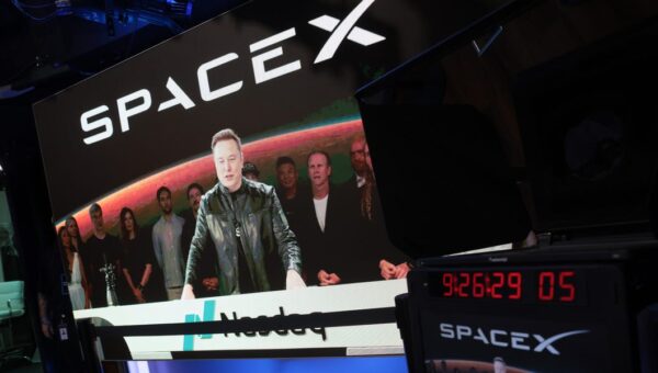 SpaceX and Tesla merger chatter is heating up. Here's how Musk's companies work together.