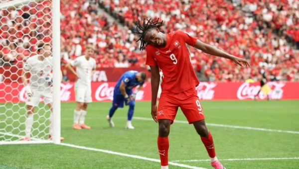 Switzerland down World Cup co-hosts Canada to top Group B, both progress