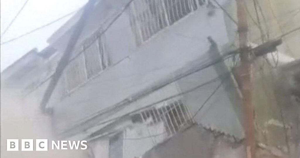 Chaos after building collapses on Caracas outskirts