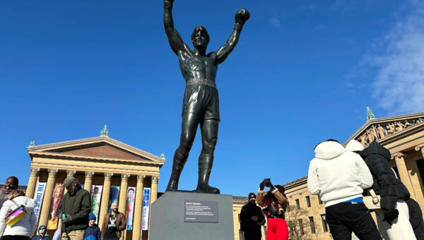 Brazilian soccer fans at the World Cup heed warning not to dress Rocky statue in team gear