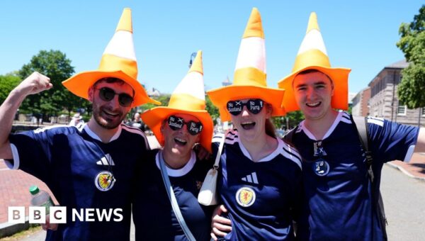 Why are Scotland fans putting traffic cones on statues in Boston?
