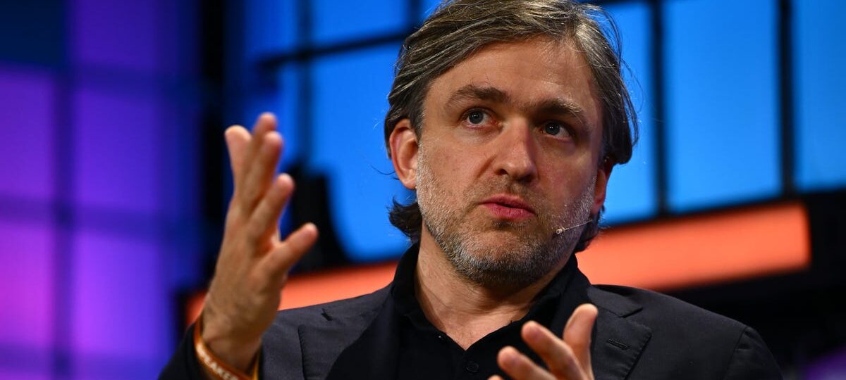 This CEO spent years betting on remote work. Now he’s evolving his stance because of AI.