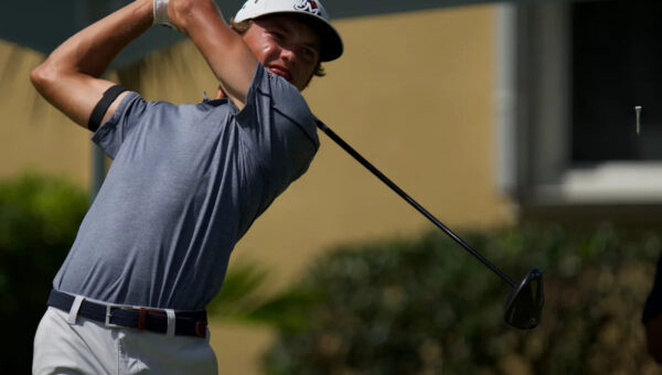 Miles Russell survives to reach U.S. Open with Charlie Woods on the bag