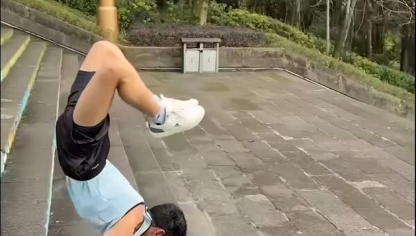 Watch: Man walks on his hands down 100 stairs in 44.71 seconds