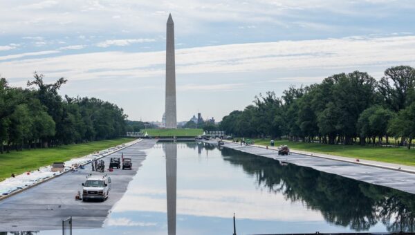 The Reflecting Pool is now 'American flag blue.' See how Trump has changed Washington, DC, during his second term.