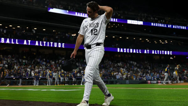 The Rockies hung around but the game got away late in a 7-1 loss to the Brewers