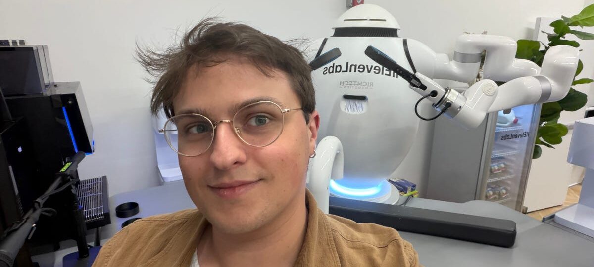 I went to ElevenLabs' NYC pop-up. A robot poured me cold brew before I haggled with an AI shopkeeper.
