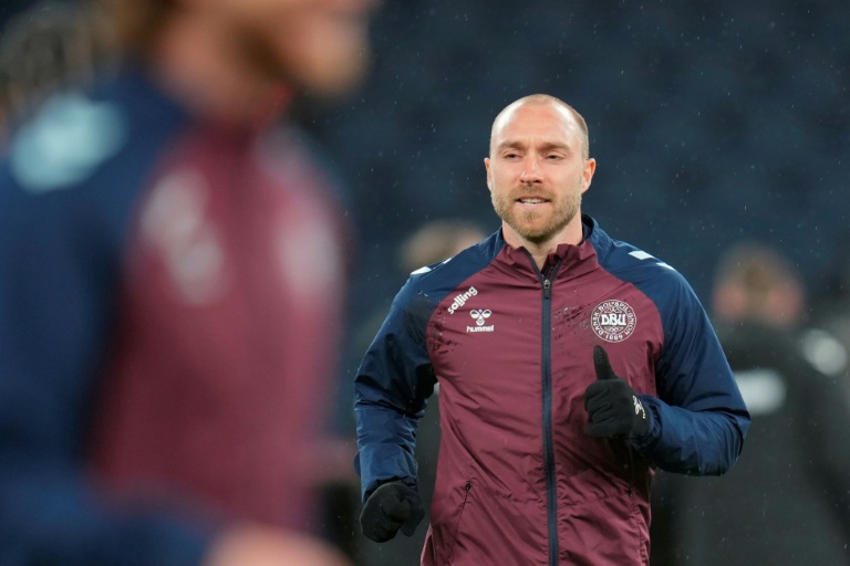 Denmark's Eriksen in 'good spirits' after collapsing during friendly
