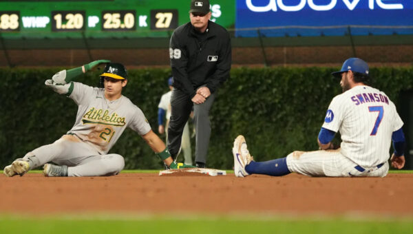 Kurtz drives in winning run in 10th as A's beat Cubs 5-4; Chicago's Happ reaches 1,000 career hits