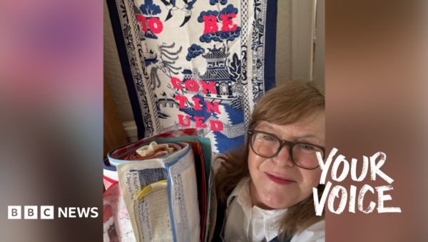 Artist happily reunited with lost tea towel art