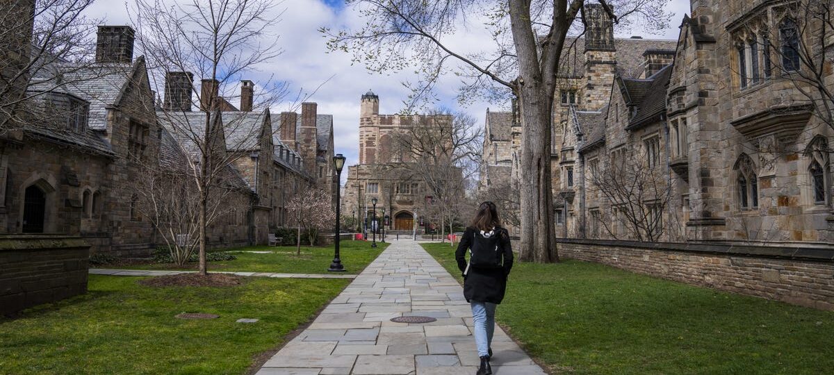 Students who attended 10 elite schools accused of price fixing are now getting payments from a $284 million settlement