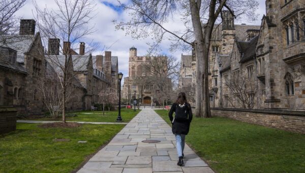 Students who attended 10 elite schools accused of price fixing are now getting payments from a $284 million settlement