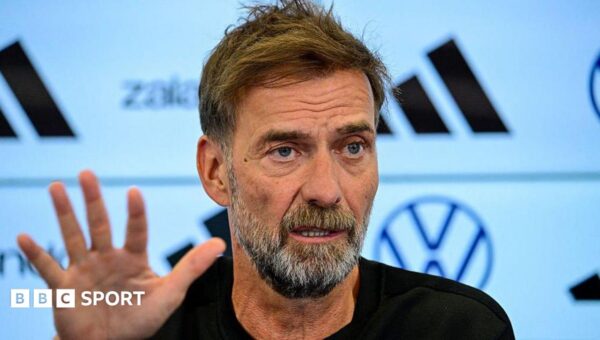 Klopp starts Germany reign by threatening to quit
