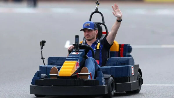 Motor racing-F1 drivers amuse British GP crowd with Lego car chaos