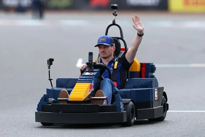 Motor racing-F1 drivers amuse British GP crowd with Lego car chaos