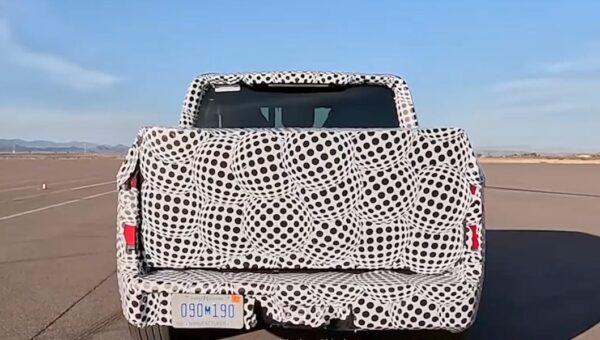 Ford's $30,000 EV truck is under wraps. Its camouflage is an ad.