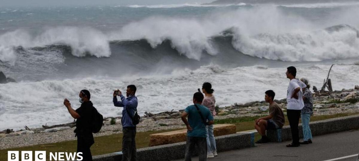 East Asia braces for destructive typhoon as landslides kill 15 in Philippines
