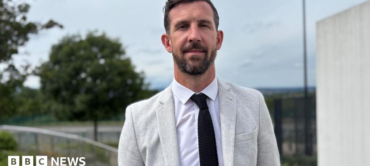 Football star swaps dressing room for classroom