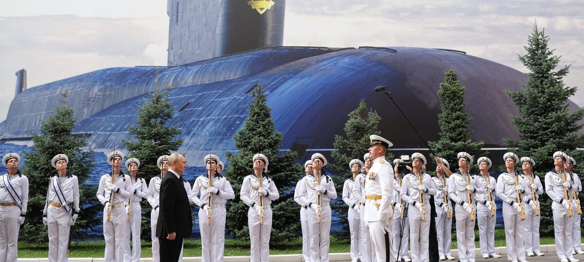 Russia replaced its once-grand Navy Day parade with a shipless event and a giant poster of a submarine