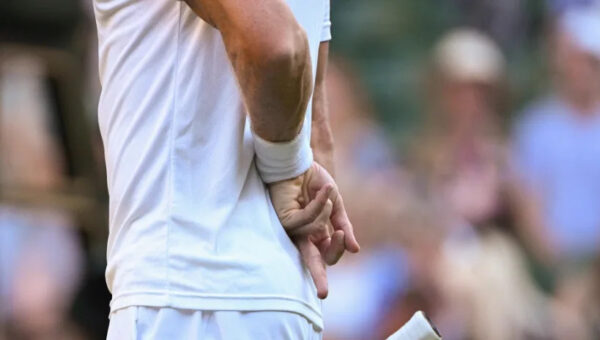 What do hand signals mean in Wimbledon doubles?