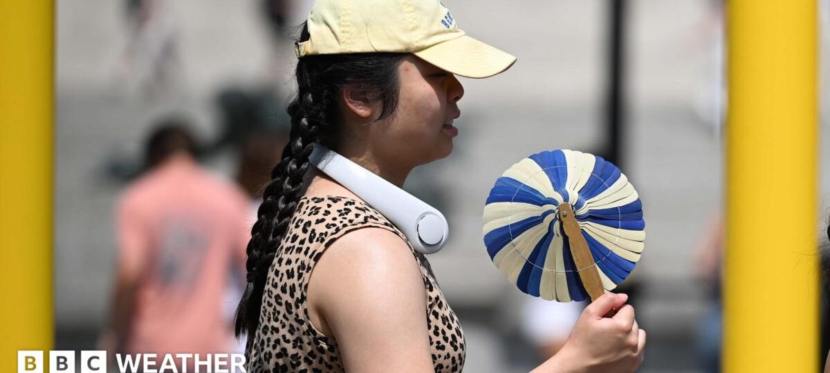 UK heatwave spreads further north and west as temperatures continue to climb