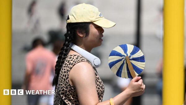 UK heatwave spreads further north and west as temperatures continue to climb