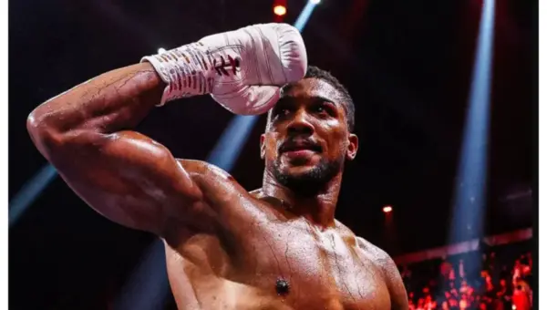 Anthony Joshua survives early knockdowns to knockout Prenga with four minutes