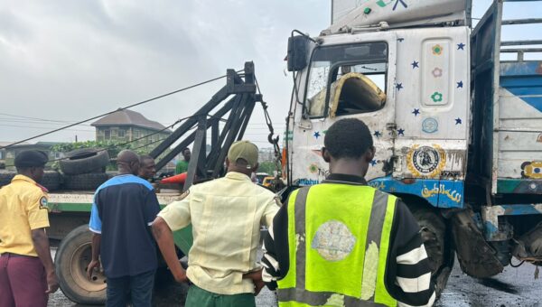 One dead, two injured as truck overturns on Kara bridge in Lagos