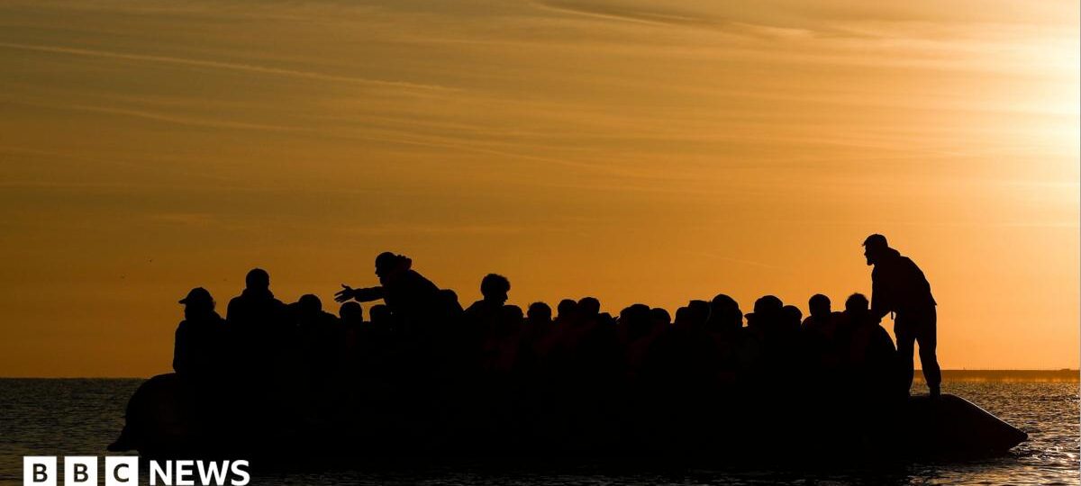 Record 128 people cross Channel in one small boat