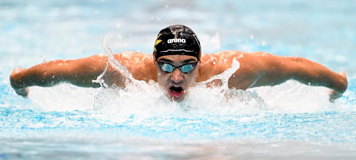 Ilya Kharun sets Meet and U.S. Open Record, out-touches Dressel, in 50 butterfly at U.S. Swimming Nationals
