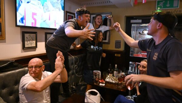 England fans celebrate as pubs set to stay open longer for Norway clash