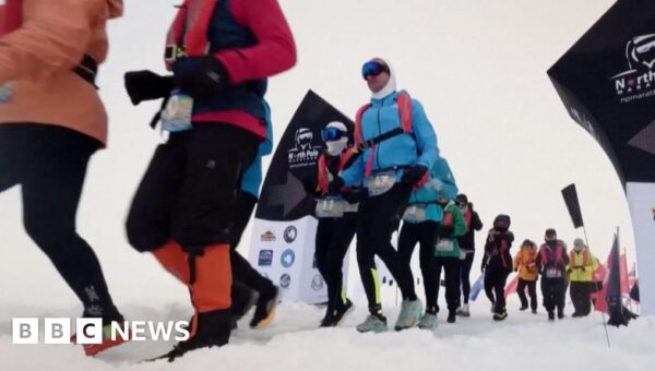 Marathon runners compete on drifting sea ice at North Pole