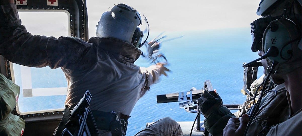 US Marines launched a drone from a moving helicopter to scout a ship for a special operations boarding team