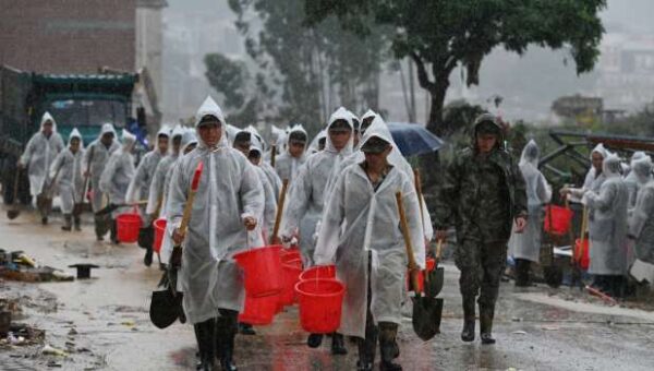 Cleanup Begins As Death Toll From China Floods Rises To 39