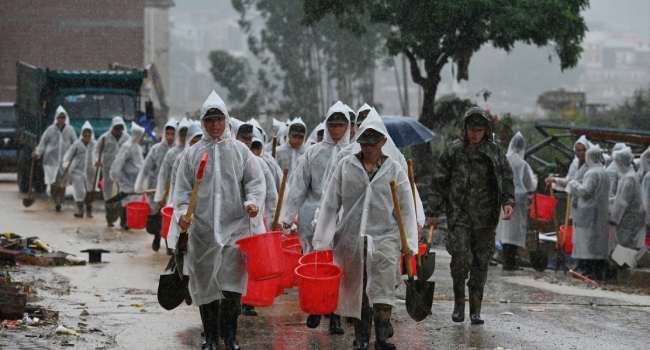 Cleanup Begins As Death Toll From China Floods Rises To 39
