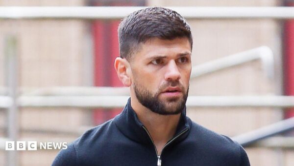 Former boxing world champion denies assaulting man, court hears