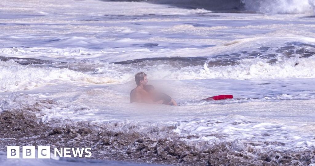 Bystander video shows teen lifeguard's dramatic ocean rescue