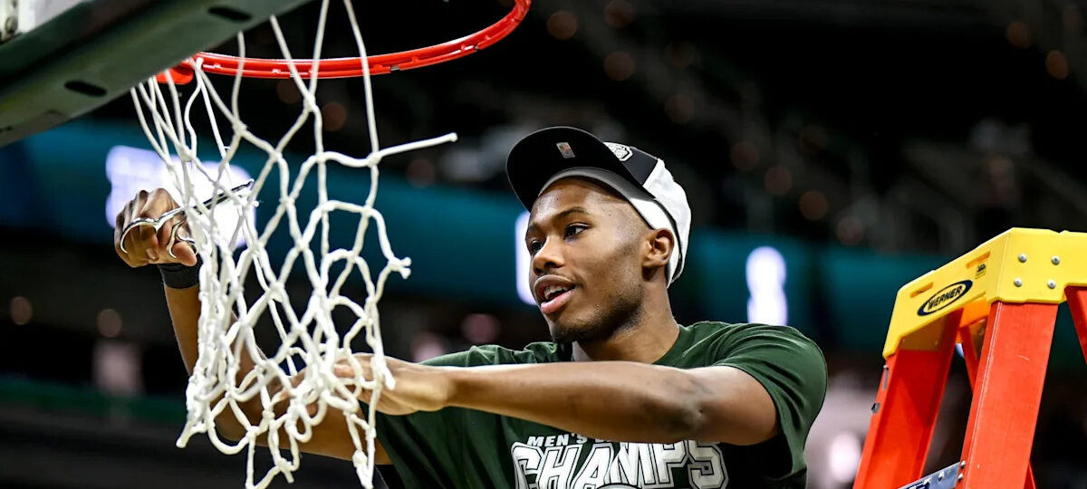 Tre Holloman returns 'home' to Michigan State after polarizing transfer