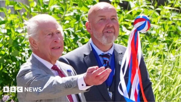 King Charles takes part in historic Borders hand ba’ game