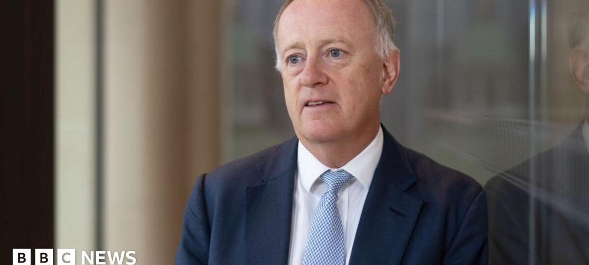 Former Lloyd's of London boss's relationship breached rules, firm says