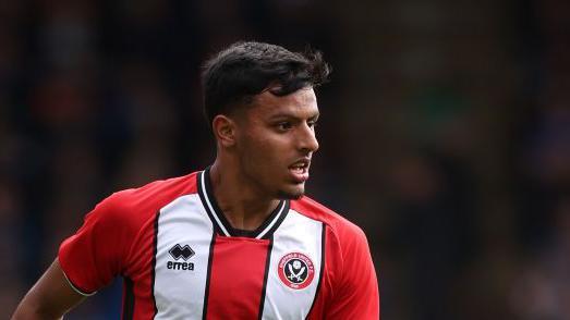 Boston sign Blades defender Sachdev on loan