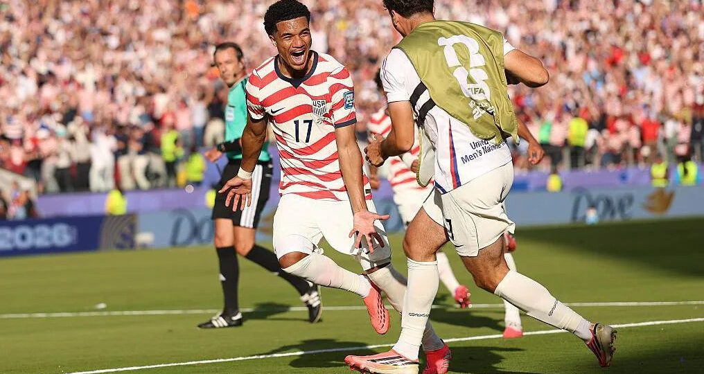 Balogun scores and is sent off as USA reach last 16