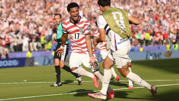 Balogun scores and is sent off as USA reach last 16