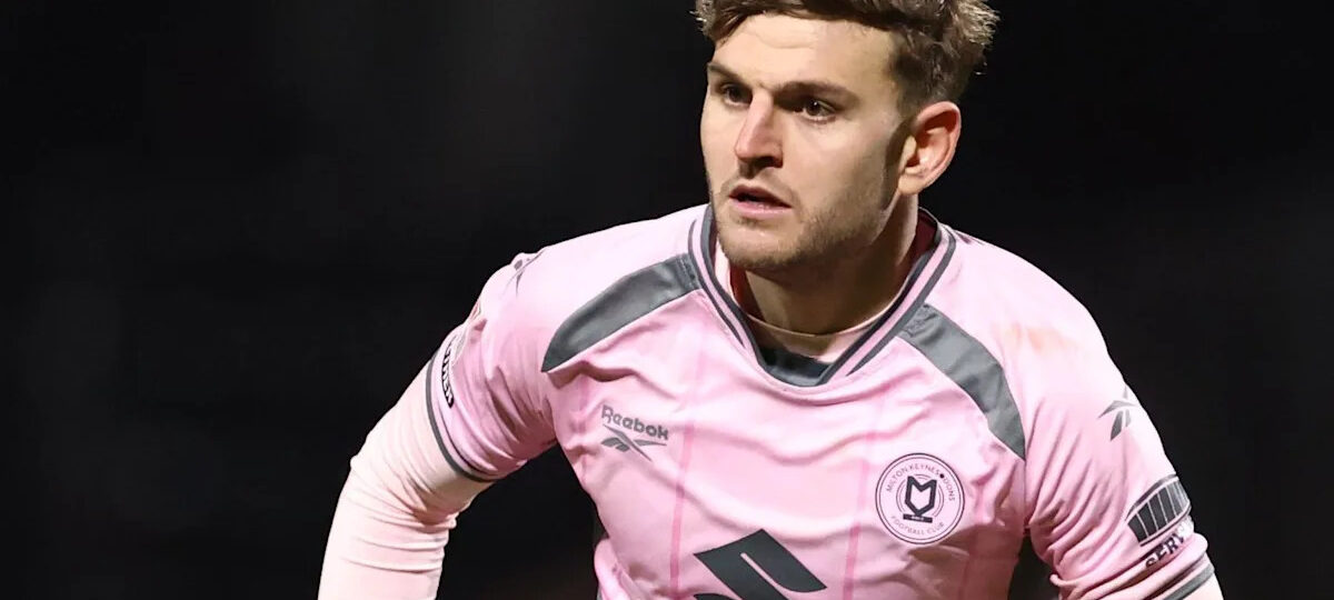 Rochdale sign former MK Dons defender Maguire