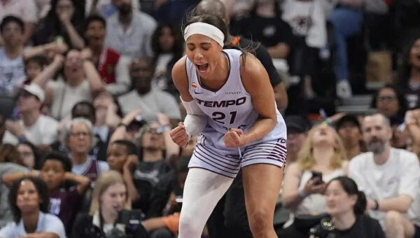 Isabelle Harrison shows off chiseled abs in striking pregame look despite missing Tempo game
