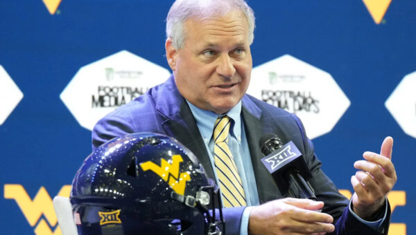 West Virginia coach Rich Rodriguez wants to save college football. Here's his pitch: