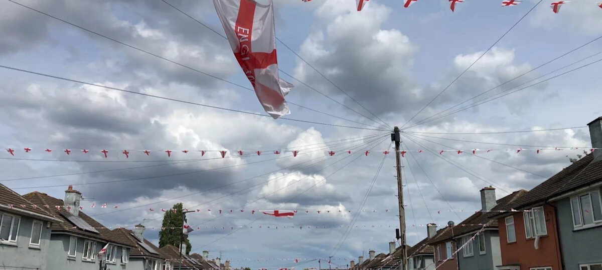 England football fans fill street with flags