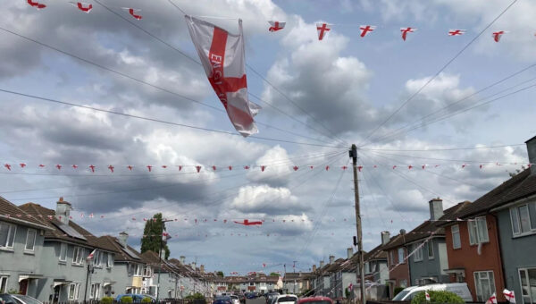 England football fans fill street with flags