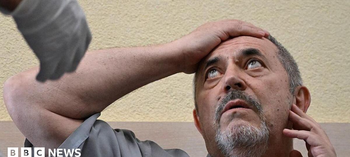 One anti-war critic fined, another held as Russia clamps down on opponents